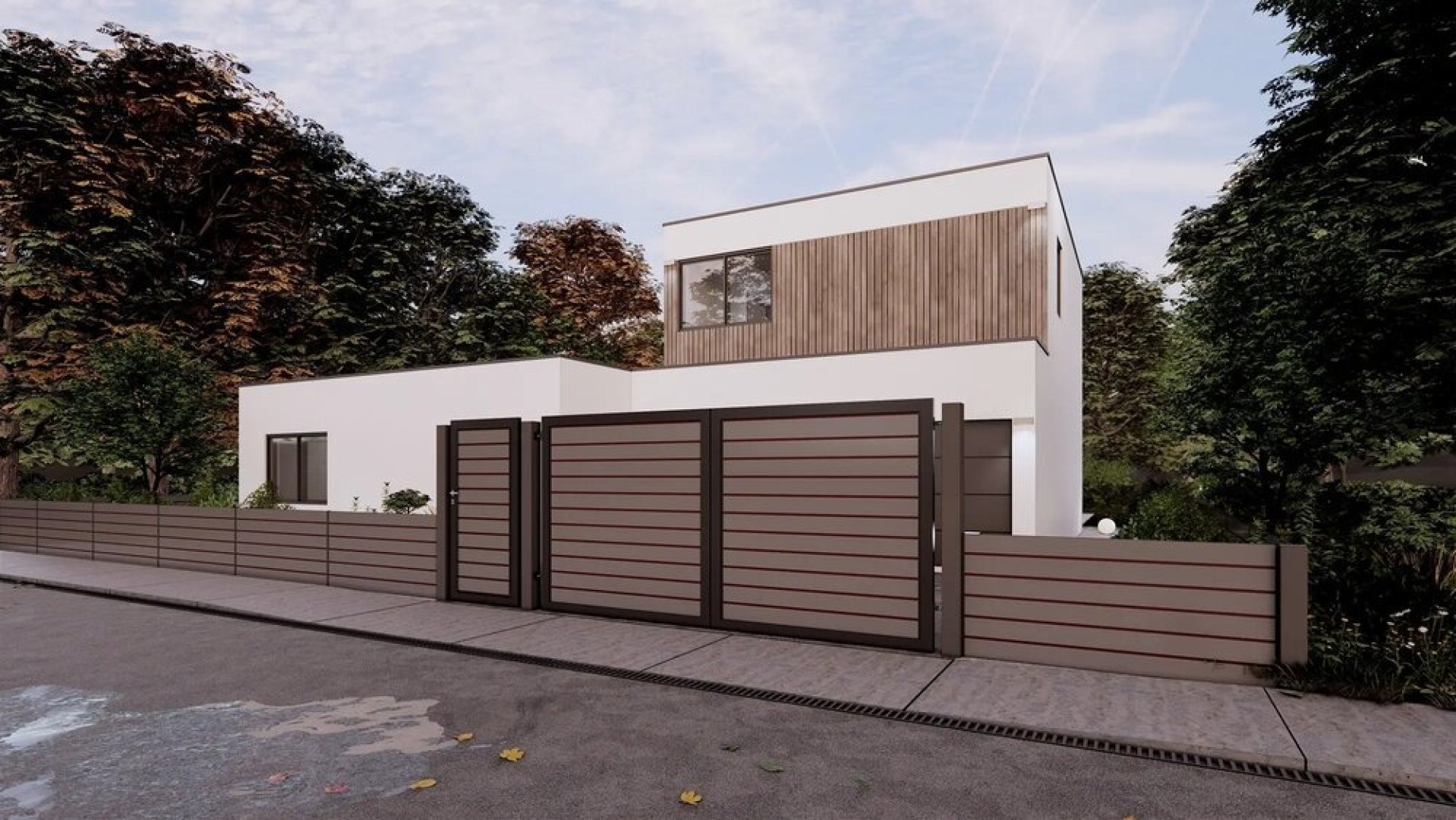 Ein modernes weißes Haus mit einem braunen Lattenzaun, einem Tor und einem kleinen Tor am Waldrand.